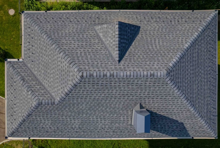 Completed roofing project with new shingles